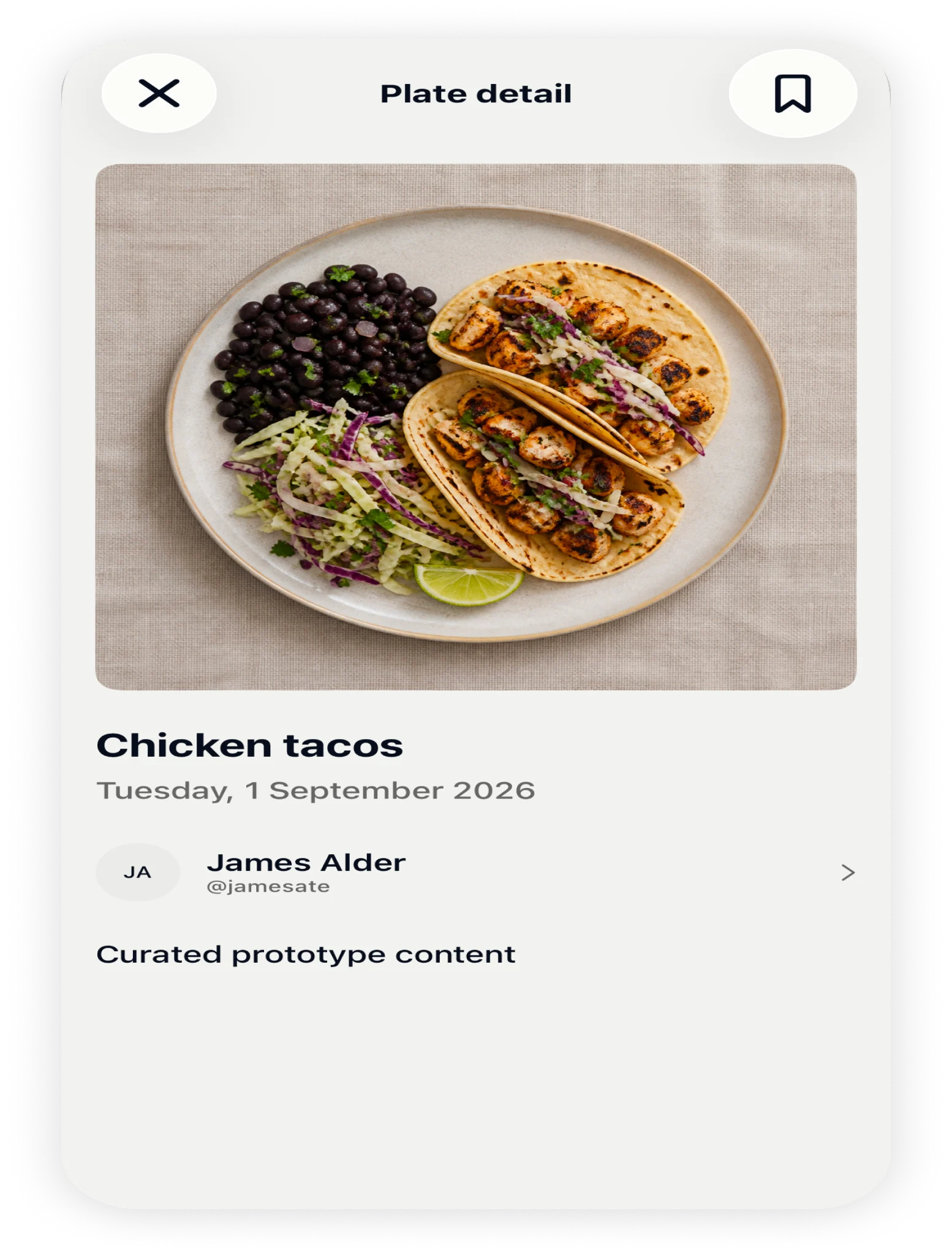 Plate detail showing chicken tacos and a save action